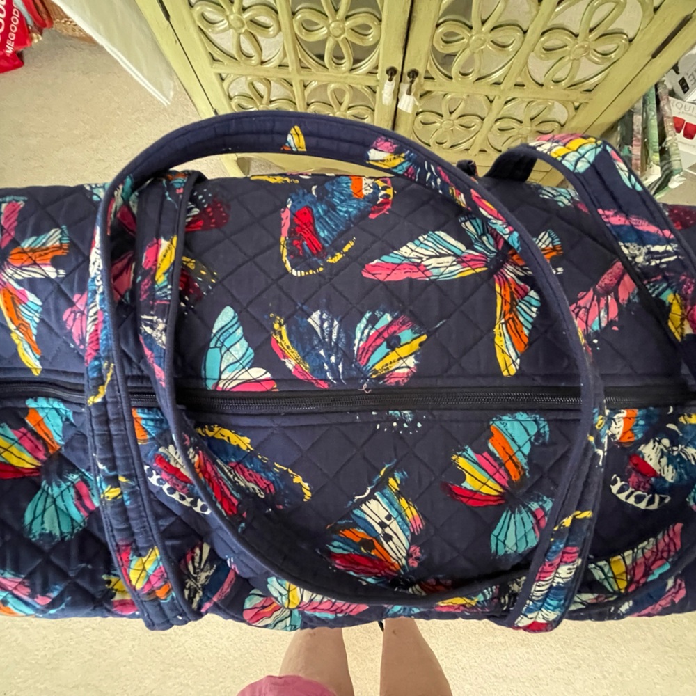 NWT   TRAVEL TOTE   Blue with colorful butterflies.